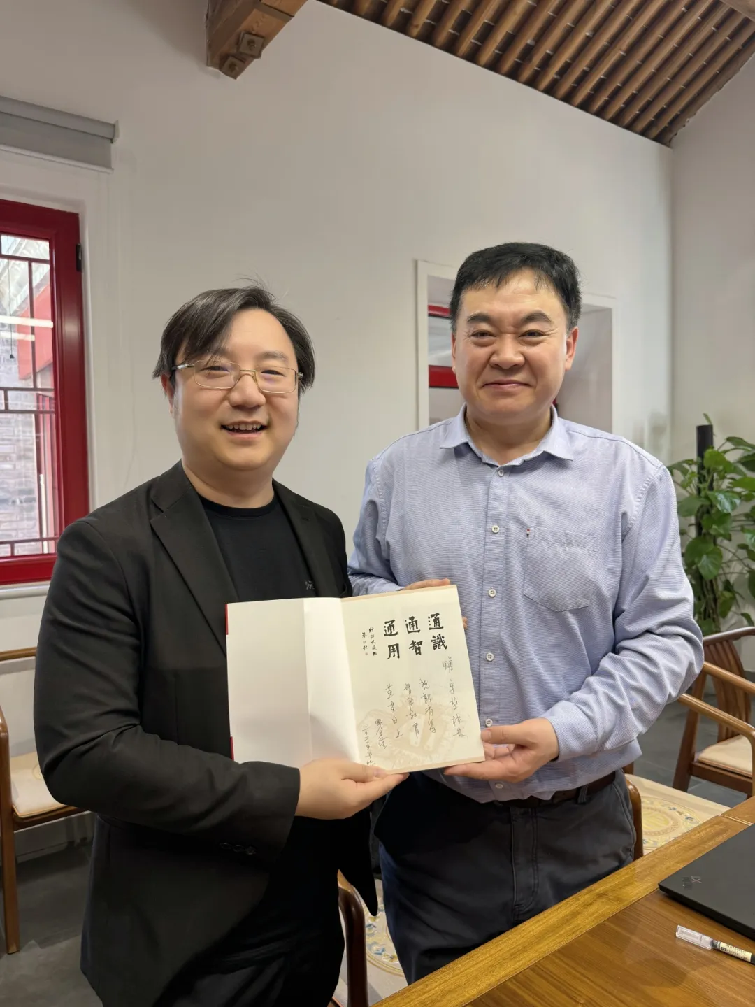 姚宇堃校长与北大智能学院副院长罗定生