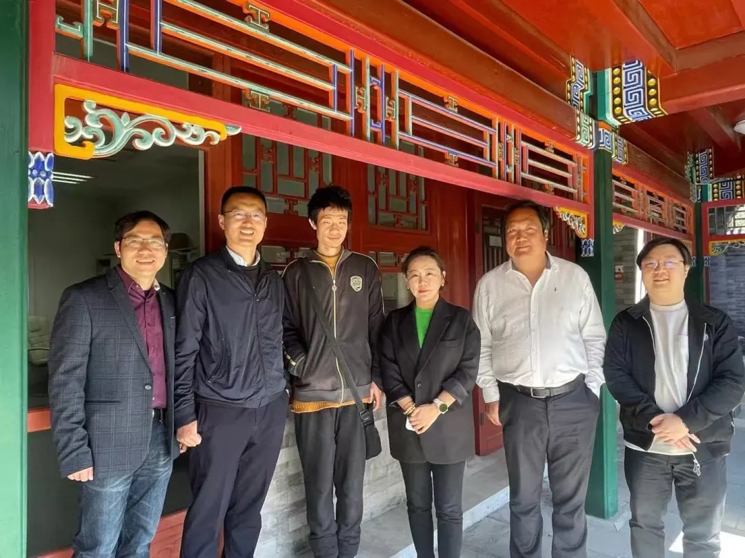 新府学校长团队与北大数学学院教授们